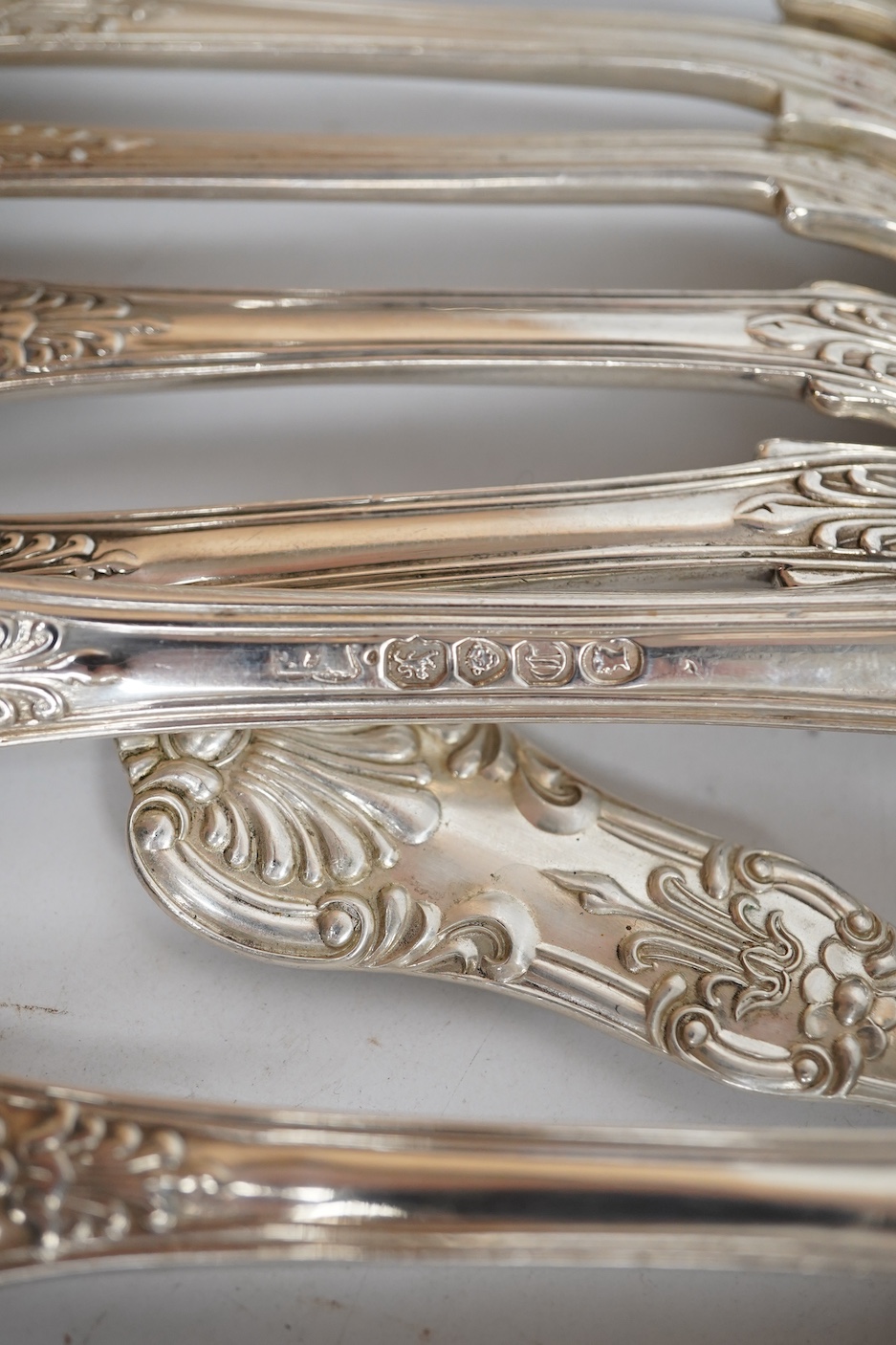 Eleven early Victorian silver Queens pattern dessert forks, by Joseph & Albert Savory, London, 1838, together with a set of four similar table spoons, William Eaton, London, 1838 and two later silver King's pattern table